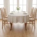 Obrus owalny beżowy 160-x260 plamoodporny z koronką szaro-kremową - ekspozycja w jadalni