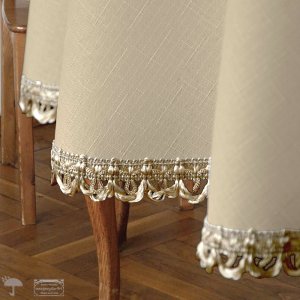 Obrus okrągły Glamour beżowo-złoty 120–160 cm – plamoodporny