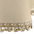 Zbliżenie materiału Zbliżenie tkaniny obrusu okrągłego 160 cm GLAMOUR beżowo-złotego, imitacja lnu,  tkanina o lekkim połysku, plamoodporny, elegancka dekoracja stołu